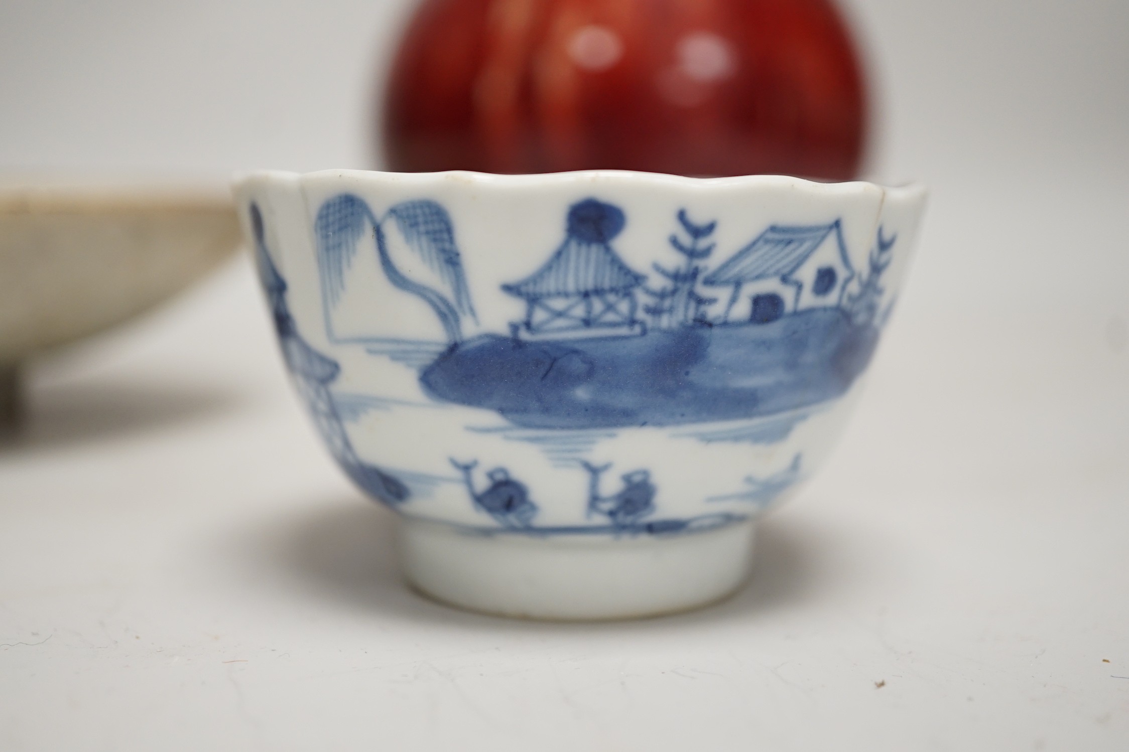 A Chinese sang de boeuf glazed bottle neck vase, together with a Chinese blue and white tea bowl, and a Chinese dish, tallest 23cm